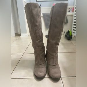 Tall taupe colored boots